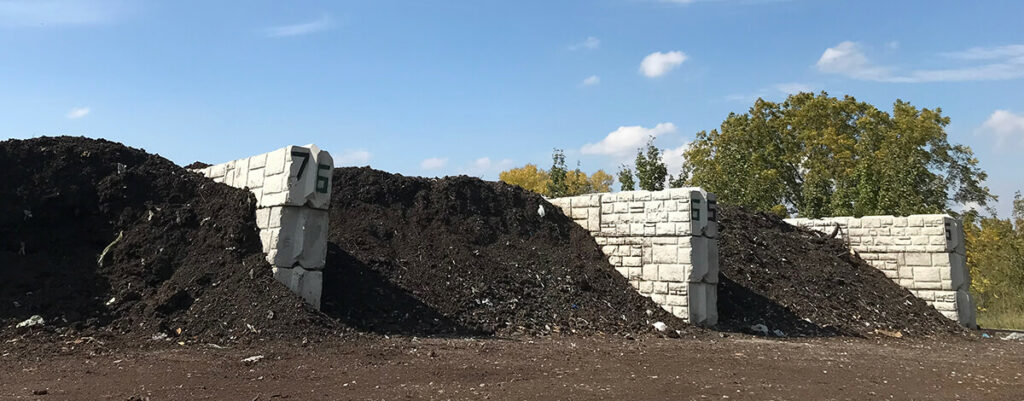 Three huge compost piles